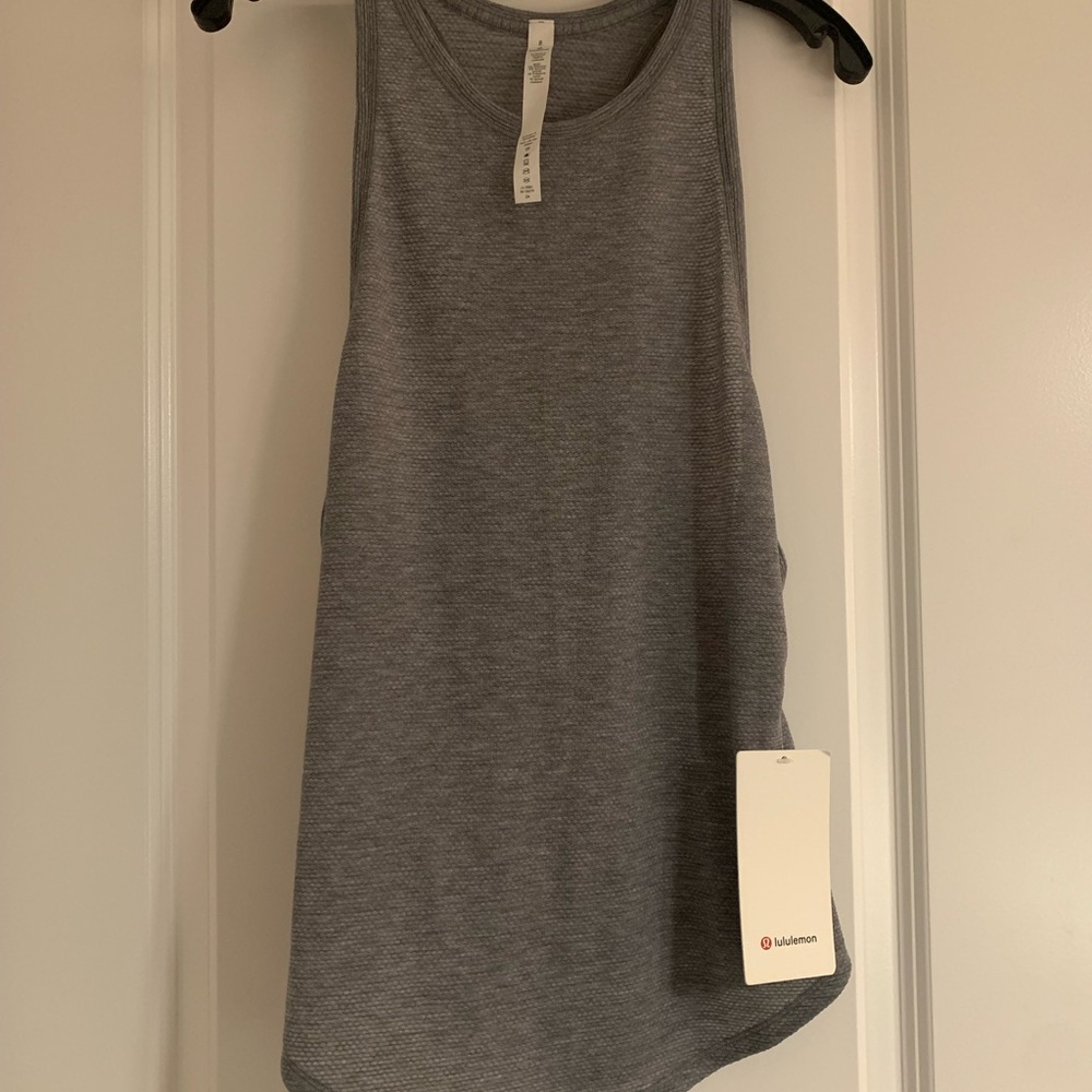 NWT Women’s Lululemon Plank To Pike Tank Top. Size 8. Heather Black. Loose Fit.